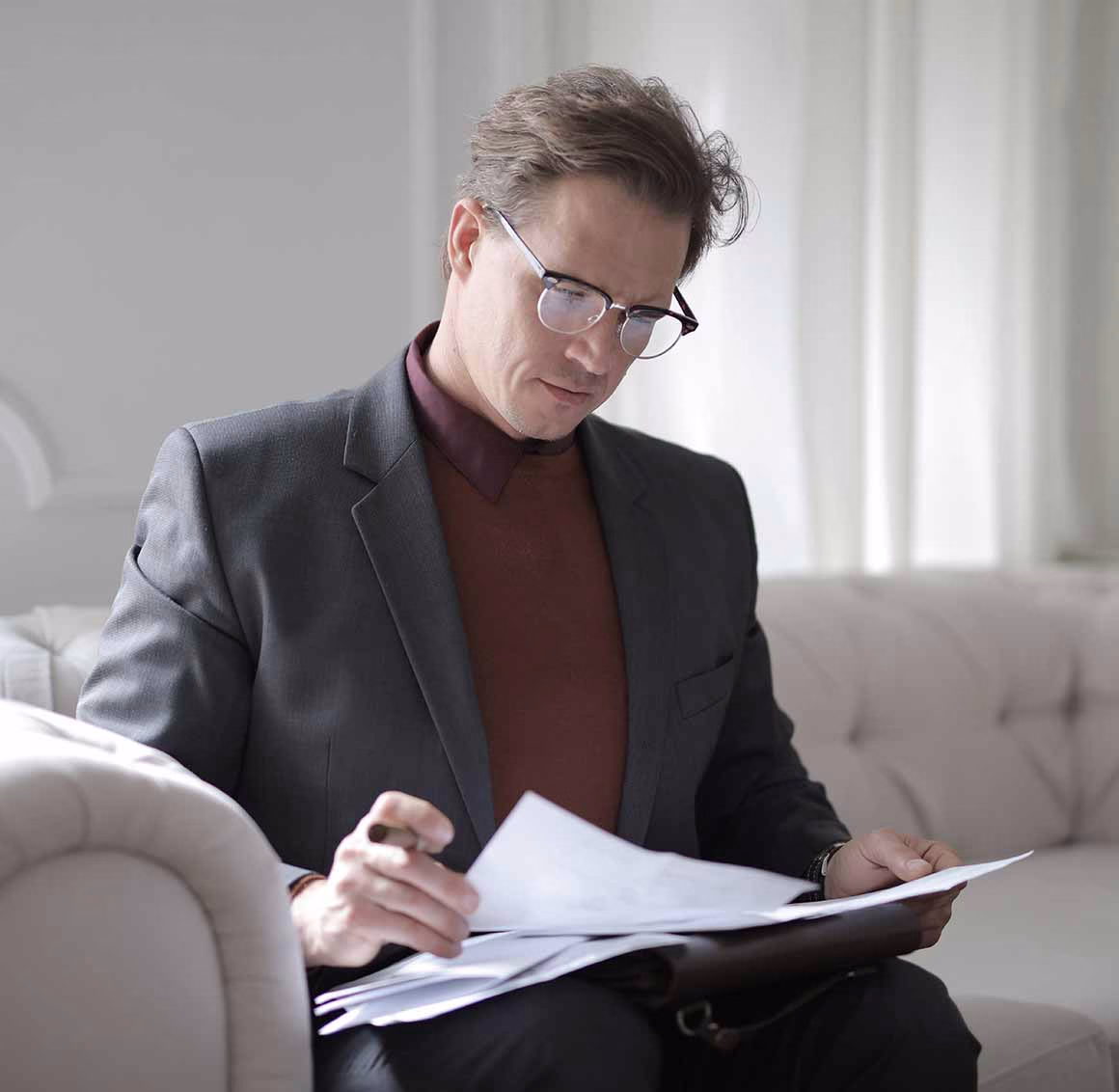 Man Going through Papers Man Going through Papers